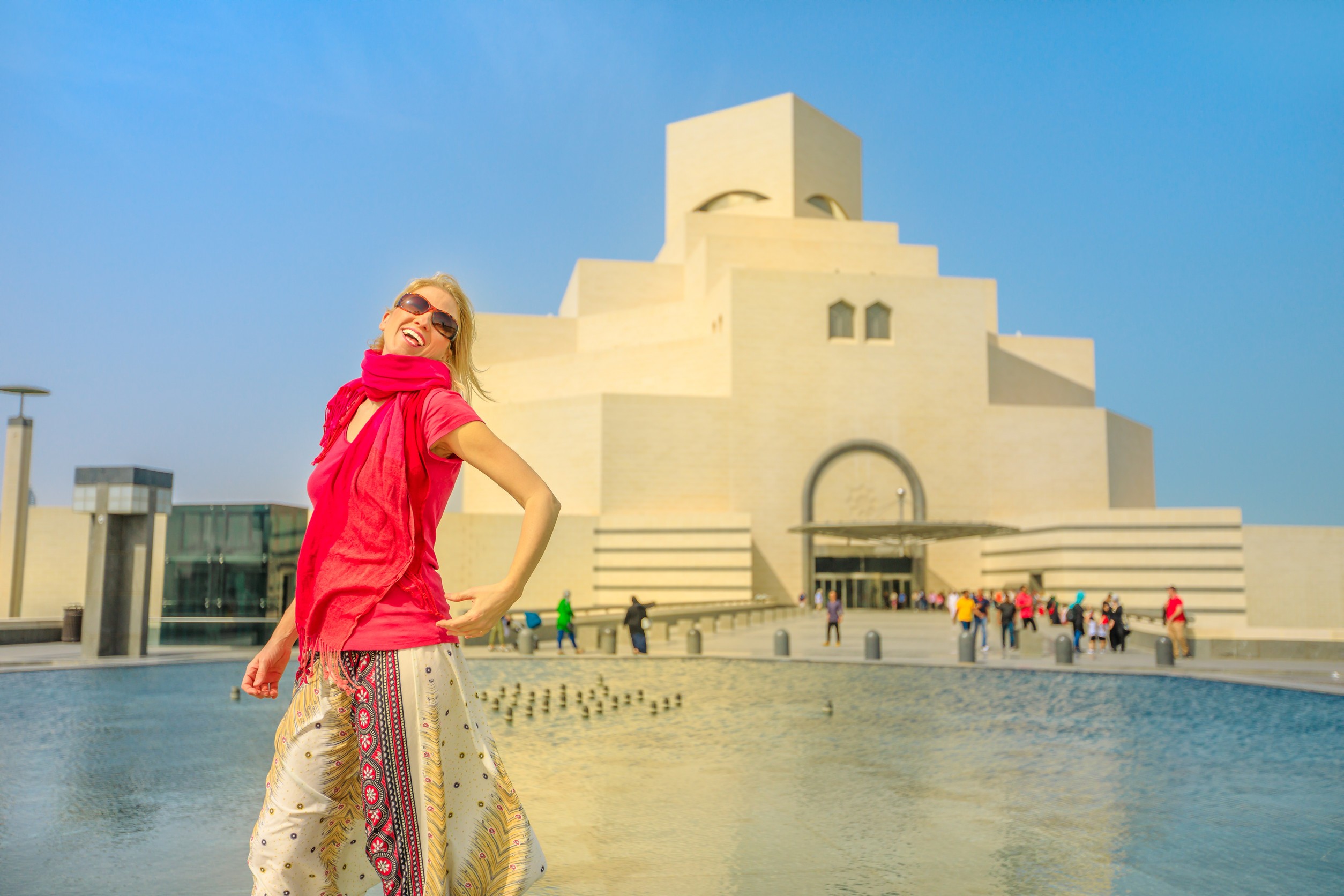 Happy tourist at Doha art museum