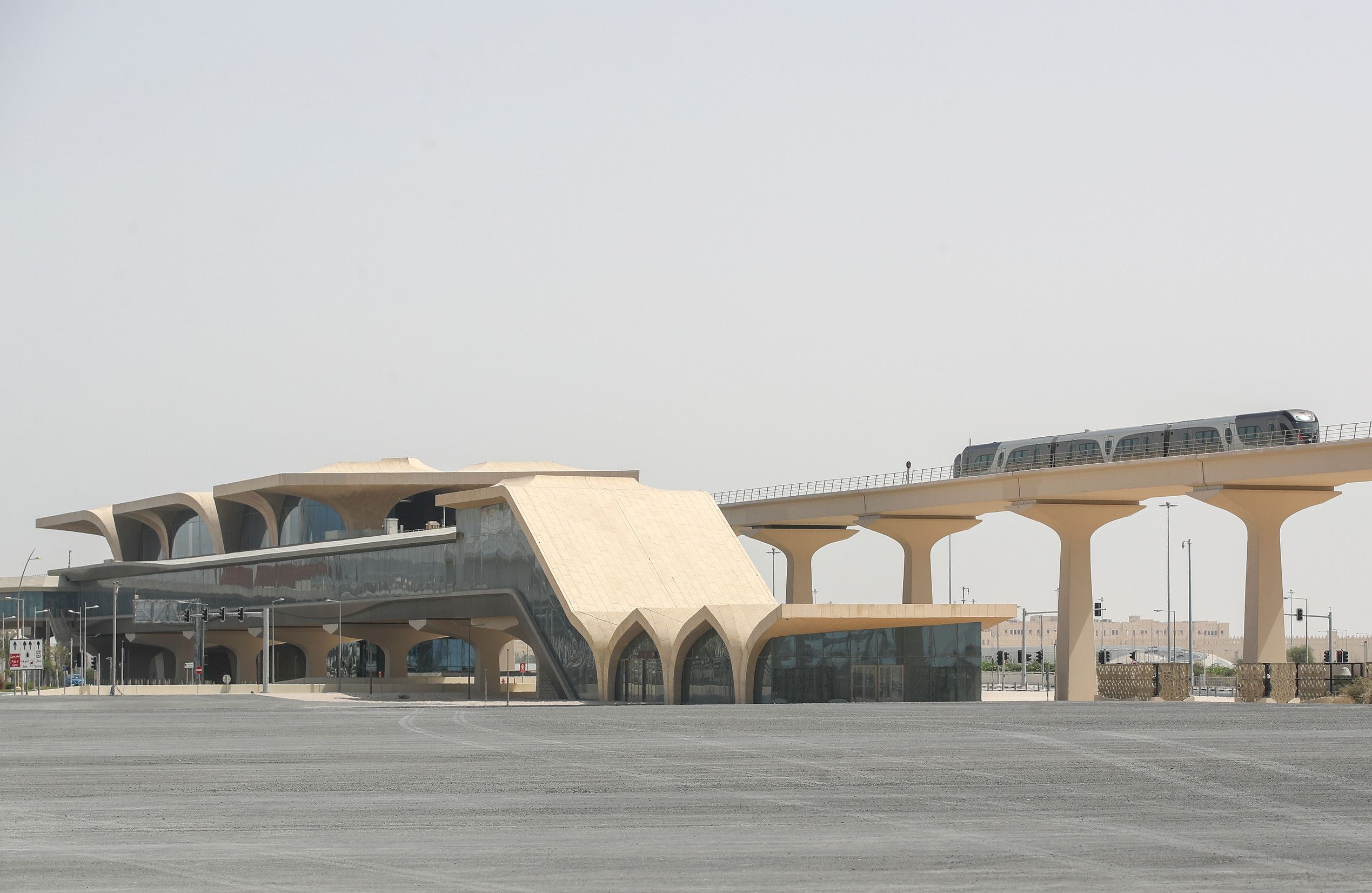 Modern Doha Metro station with train